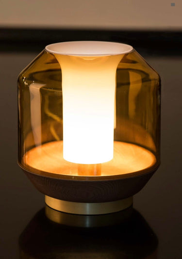 Contemporary table lamp for hotel rooms with warm LED glow