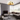 Brass finish Panel 75 designer chandelier hanging above living room
