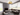 Brass finish Panel 75 designer chandelier hanging above living room