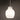 Opal pendant, lit against a dark wall | Pomelo by Innermost