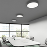 Dimmable flush mount ceiling light with integrated LED in matte white in conference room setting