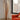 Walnut timber Iris floor lamp by Macmaster, handmade organic shape