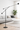 Modern sculptural LED floor lamp by Artemide inspired by balanced engineering