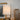 Jynn Cordless Dark Antique Brass Lamp in a living room setting