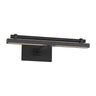Nightshade black picture light with adjustable arm for framed photography in a living room setting
