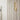 Natural brass LED wall sconce with modern industrial look, ideal for upscale powder rooms or vanities