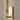 Close-up of Kal Small Sconce in Natural Brass showing patina-ready finish and crystal diffuser