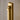 Visual Comfort Kal LED Sconce in warm brass finish mounted vertically in a luxury hallway