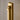 Visual Comfort Kal LED Sconce in warm brass finish mounted vertically in a luxury hallway