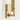 Kal Small Sconce in Natural Brass finish providing warm glow lighting in residential bathroom design