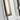 Close-up of Kal Small Sconce in polished nickel finish showing mechanical joints and clean design