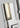 Close-up of Kal Small Sconce in polished nickel finish showing mechanical joints and clean design