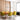 Customizable Koncept Z-Bar modular pendant lighting system with four rotatable bars over a dining room table.