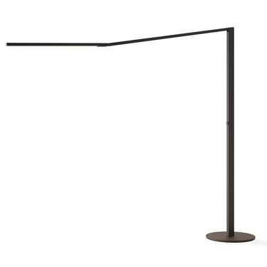 Black Z-Bar Titan LED slim floor lamp with adjustable arm in modern living room lighting setup.