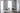 Minimalist Y-shape LED pendant lamp by Koncept Tech hanging above dining table.