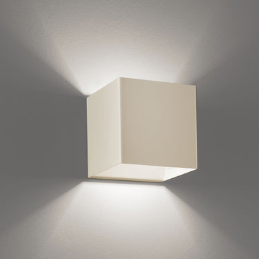 Laser Wall Sconce by Lodes with compact geometric design and 16W LED for hallways, bedrooms, and living rooms