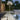 Oluce Lyndon 351 outdoor floor lamp on a poolside terrace at dusk