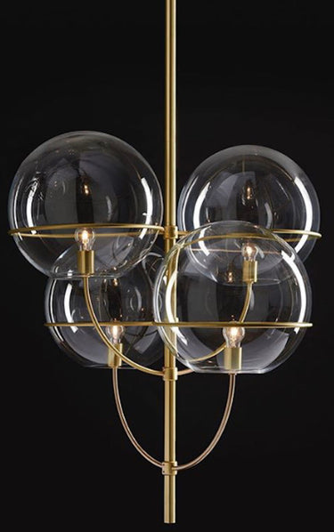 Lyndon pendant light by Oluce with transparent glass globe, studio shot