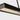 Sculptural 48" linear chandelier with a textured glass shade that mimics frozen water