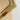 Minimalist natural brass LED wall sconce, 7.5 inches tall, perfect for ADA compliant installations