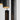 Angled profile view of sleek Roest modern steel tube pendant light