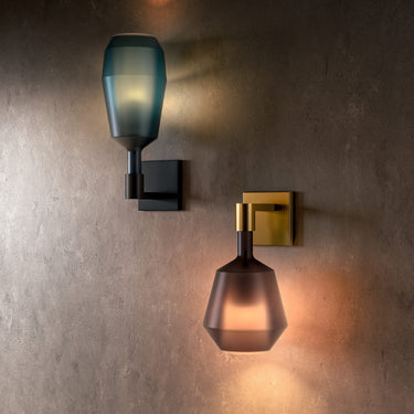 Penta MoM wall sconce with matt glass shade on a metal arm