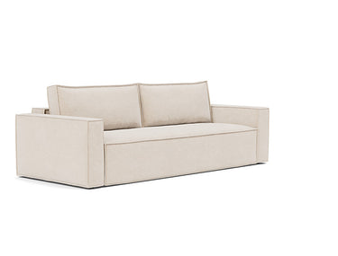 Newilla sofa bed with soft pocket spring comfort in 255 Adario Basmati fabric