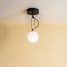 Modern nh 14 ceiling light with blown glass diffuser and brass ring by Artemide, ideal for bedrooms and hotel suites