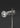 Detail of the Agnoli table lamp in satin black nickel on a dark background