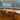 Agnoli table lamps on office desks in a modern workspace