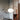 Oluce Alba 466 pendant light hanging in a styled room