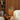 Oluce Berlin-Out table lamp on a side table in a library corner
