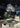 Lyndon pendant light by Oluce over a dining table, lifestyle view