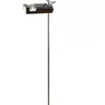 Oluce Spider floor lamp in black with adjustable reflector on a chrome stem
