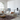 Oluce Superluna floor lamp in a bright loft living room