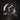 Oluce The Globe table lamp in satin nickel with transparent blown glass sphere on a dark studio background