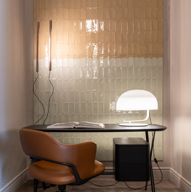 Oluce Zanuso 275 table lamp in white with a large opal diffuser on a curved support