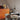 Oluce Kin large pendant light, studio shot of the flared cast aluminium body