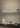 Oluce Dancing Glass suspension lamp lit, lifestyle view