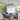 Matte black linear island chandelier with adjustable hanging chain for home kitchen and dining room.