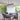 Matte black linear island chandelier with adjustable hanging chain for home kitchen and dining room.