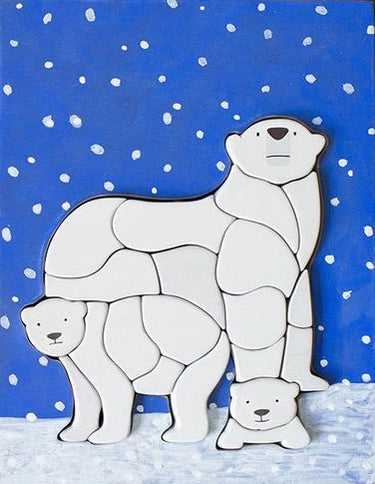 Polar Bear Puzzle by Eguchi Toys, completed puzzle with snowy blue background