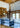 ET2 Quartz crystal pendants hanging at varied heights in a living room with a wood-beamed vaulted ceiling