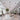 Lodes Random Solo dimmable pendant light showcasing its smooth light adjustment capabilities in a hotel lobby