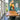 ET2 Rinkle acrylic sheet pendant above a wood slab dining table in front of a teal and white striped wall