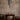 Roest steel pendants over a breakfast nook with a brick wall, Graypants lifestyle photo