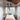 Cluster of Roest steel pendants over a dining table, Graypants lifestyle photo