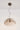 Penta Runa pendant light on, still life showing the glass arms