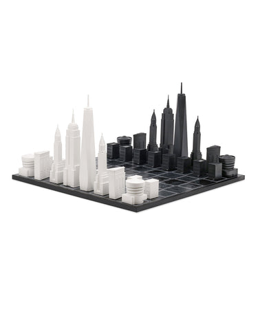 Acrylic New York architecture chess pieces by Skyline Chess on the wood map board