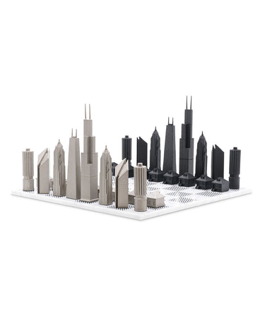 Stainless Steel Chicago architecture chess pieces by Skyline Chess on the carrara marble board